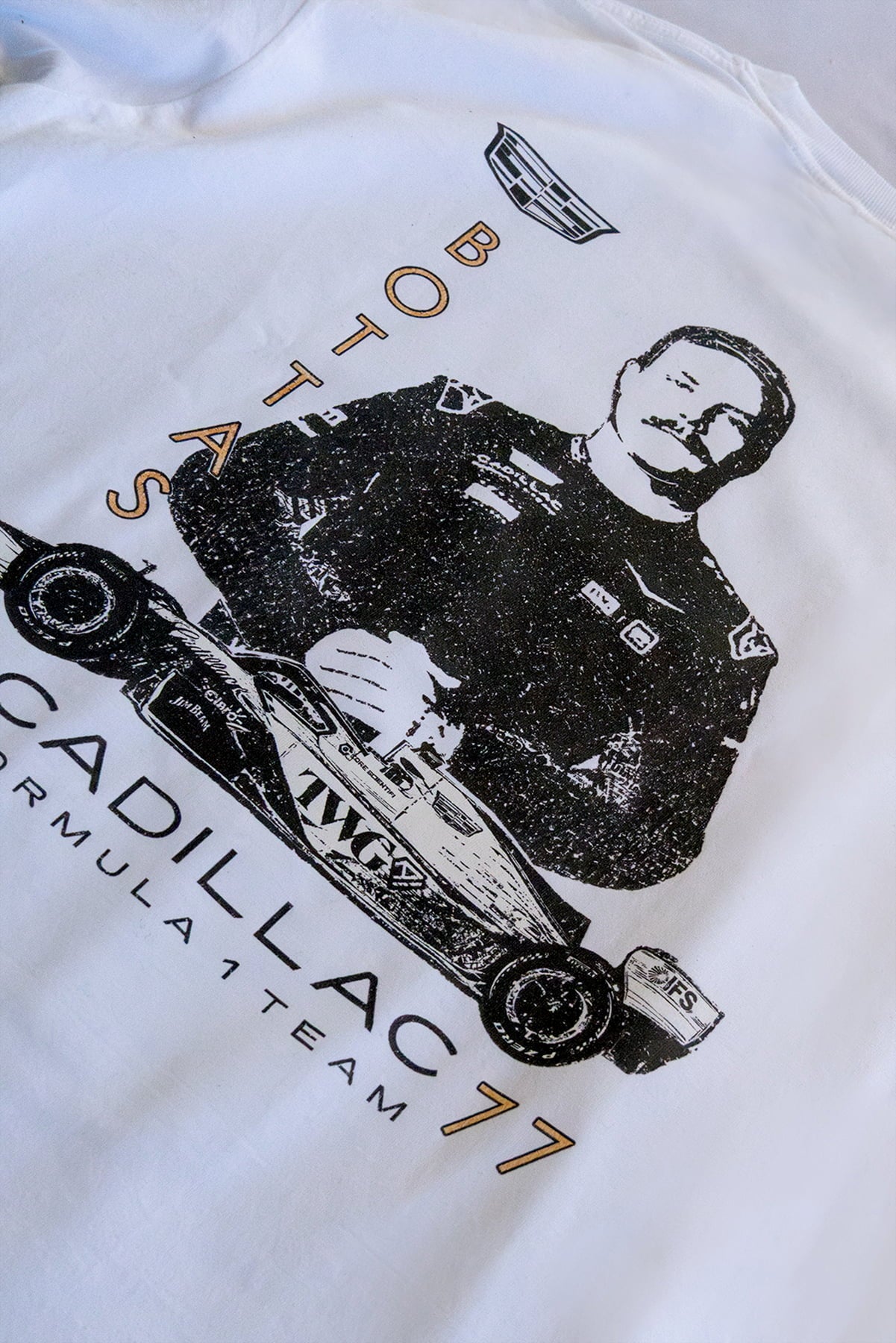 Close up back view of custom Cadillac t shirt inspired by Valtteri Bottas. Highlighting the graphic design on the back of a white cotton tee.