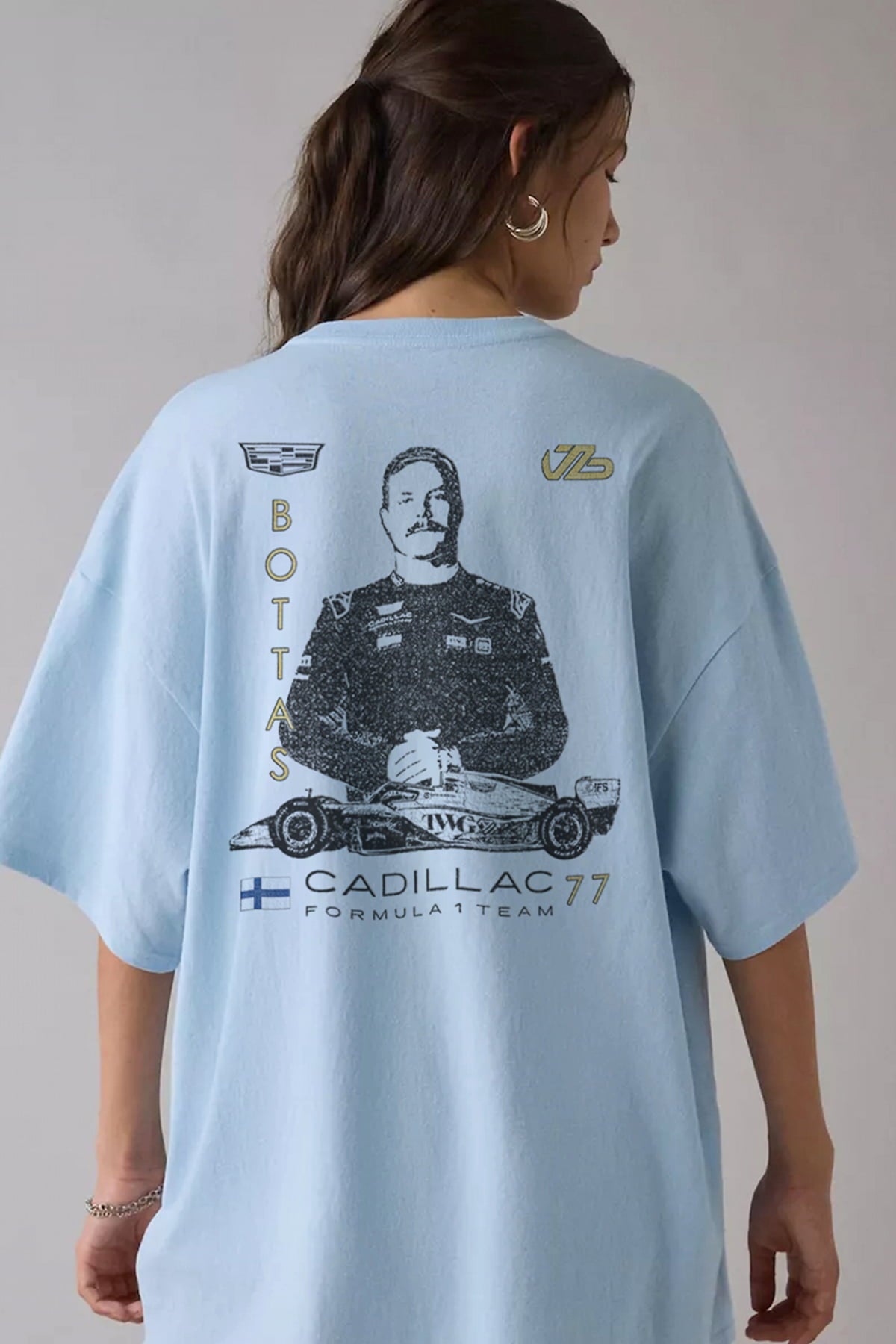 Model in a Utmost Province Bottas inspired Cadillac F1 shirt, showcasing the design on the bacck of a chambray Comfort Colors tee.