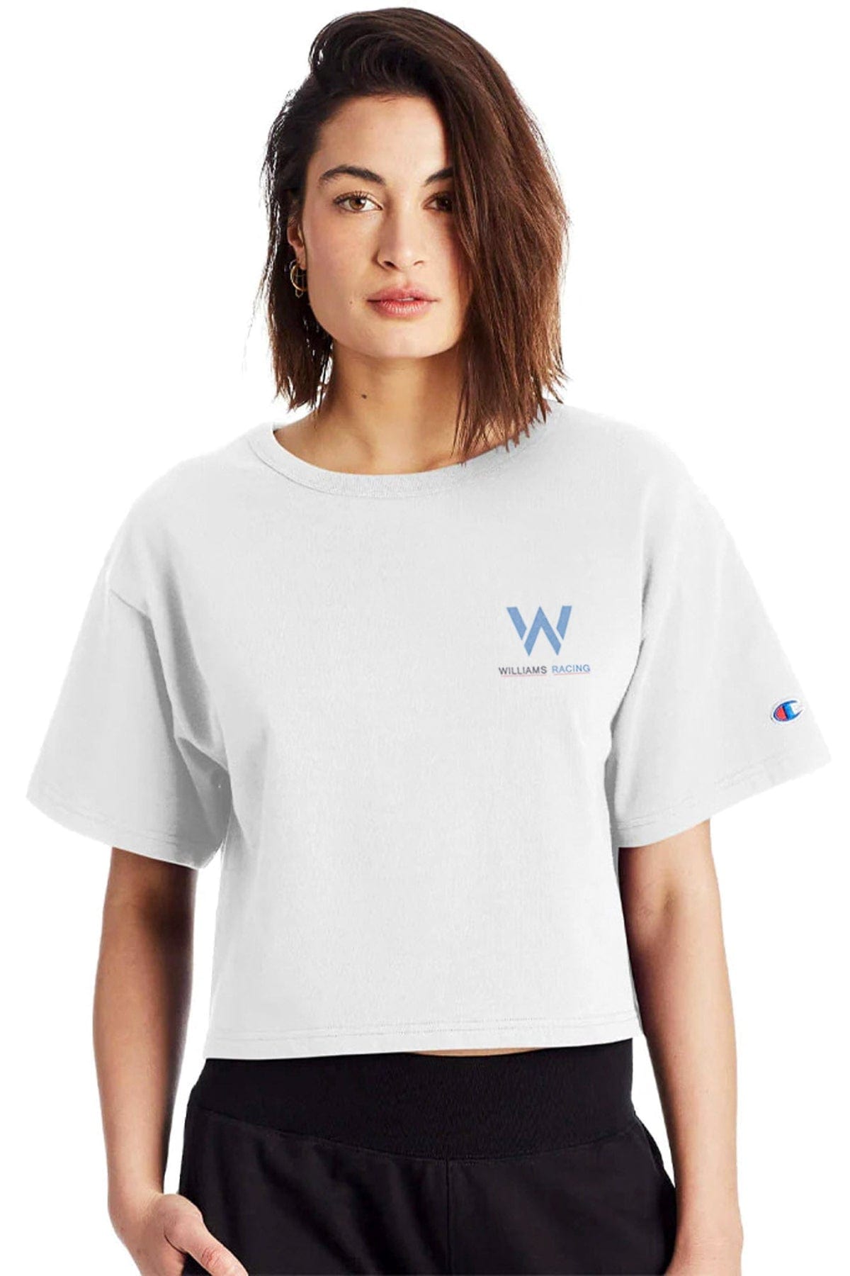 Person wearing a white cropped shirt, showcasing the front graphic design designed by Utmost Province.